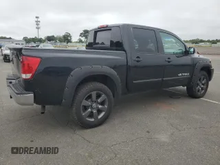 2015 Nissan Titan SV with VIN 1N6AA0EC2FN503980, listed as a Copart auction lot 64664665 with 124,589 mi miles and Clean title. Bid and sale history available at DreamBid. Image 3.