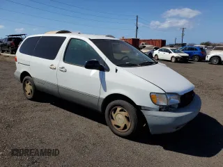 2000 Toyota Sienna LE with VIN 4T3ZF13C8YU252345, listed as a Copart auction lot 75563984 with 157,083 mi miles and Salvage Title. Bid and sale history available at carsss.com. Image 4.