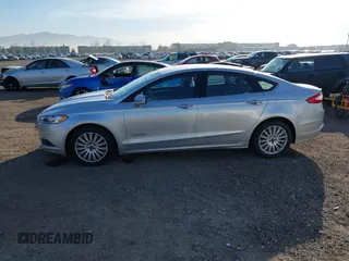 2014 Ford Fusion SE Hybrid with VIN 3FA6P0LU4ER206343, listed as a IAAI auction lot 41600260 with 198,834 mi miles and . Bid and sale history available at DreamBid. Image 14.