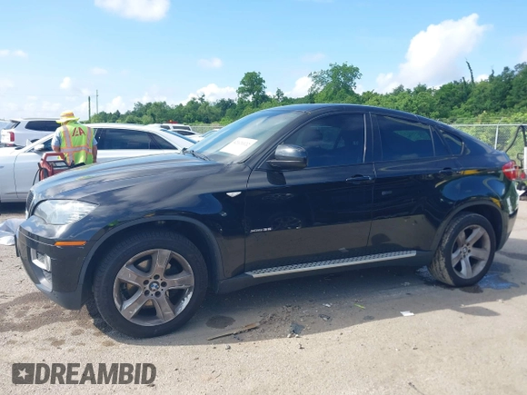 2014 BMW X6 xDrive35i with VIN 5UXFG2C5XE0C43526, listed as a IAAI auction lot 42121122 with 199,564 mi miles. Bid and sale history available at carsss.com. Image 14.