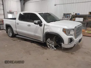 2020 GMC Sierra 1500 Denali with VIN 1GTU9FEL9LZ116486, listed as a IAAI auction lot 41392384 with 61,283 mi miles and . Bid and sale history available at carsss.com. Image 1.