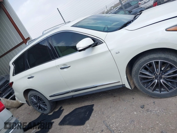 2017 Infiniti QX60 with VIN 5N1DL0MM7HC519011, listed as a IAAI auction lot 41804659 with 118,401 mi miles and . Bid and sale history available at DreamBid. Image 13.
