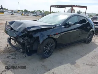 2021 Mazda 3 Premium Plus z VIN JM1BPBNY2M1403797, wystawiony jako IAAI lot #42031637 z przebiegiem Nie podano mil oraz . Historia ofert i sprzedaży dostępna na DreamBid. Obrazek 2.