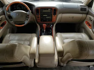 2000 Lexus LX 470 z VIN JT6HT00W8Y0126253, wystawiony jako Copart lot #49400665 z przebiegiem 181 328 mil mil oraz Szkody całkowita. Historia ofert i sprzedaży dostępna na DreamBid. Obrazek 8.