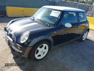 2002 MINI Hardtop with VIN WMWRC33402TC32985, listed as a IAAI auction lot 42608636 with 159,996 mi miles and . Bid and sale history available at DreamBid. Image 2.
