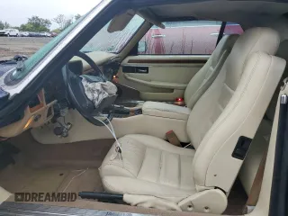 1995 Jaguar XJS with VIN SAJNX2741SC198516, listed as a Copart auction lot 69795314 with 75,227 mi miles and Salvage Title. Bid and sale history available at carsss.com. Image 7.