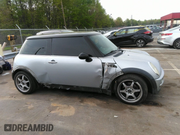 2002 MINI Hardtop with VIN WMWRC33432TE10226, listed as a IAAI auction lot 41973956 with 156,445 mi miles and . Bid and sale history available at DreamBid. Image 13.