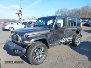 2024 Jeep Wrangler Willys z VIN 1C4RJXN60RW293872, wystawiony jako IAAI lot #41908133 z przebiegiem 850 mil mil oraz . Historia ofert i sprzedaży dostępna na DreamBid. Obrazek 17.