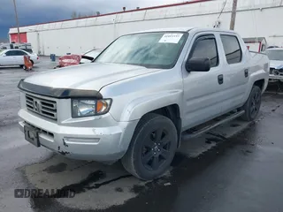2008 Honda Ridgeline RT with VIN 2HJYK16228H517329, listed as a IAAI auction lot 41813333 with 139,828 mi miles. Bid and sale history available at carsss.com. Image 2.