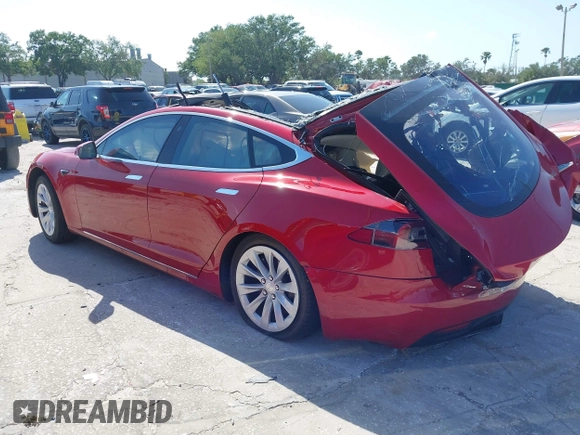 2016 Tesla Model S 90D with VIN 5YJSA1E27GF167442, listed as a IAAI auction lot 41989371 with Not Provided miles and . Bid and sale history available at DreamBid. Image 3.