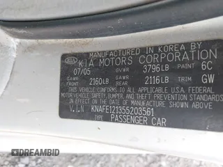 2005 Kia Spectra LX with VIN KNAFE121355203561, listed as a IAAI auction lot 41894533 with 32,889 mi miles. Bid and sale history available at carsss.com. Image 9.