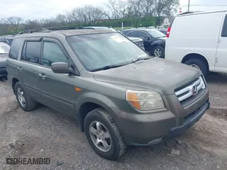 2007 Honda Pilot EX-L with VIN 5FNYF28617B039309, listed as a IAAI auction lot 41951978 with 239,583 mi miles. Bid and sale history available at carsss.com. Image 1.