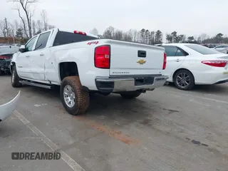 2018 Chevrolet Silverado 1500 LT with VIN 1GCUKREC0JF208509, listed as a IAAI auction lot 41794616 with 96,962 mi miles and . Bid and sale history available at DreamBid. Image 3.