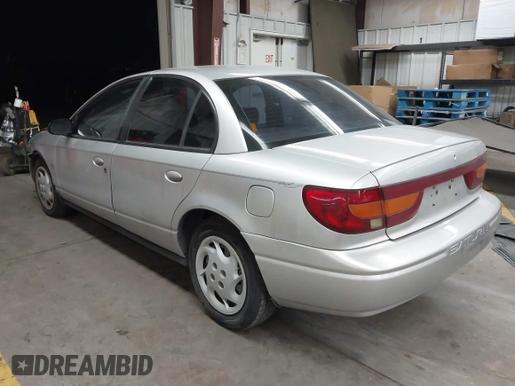 2002 Saturn SL with VIN 1G8ZK54762Z143727, listed as a IAAI auction lot 42441687 with 102,722 mi miles and . Bid and sale history available at DreamBid. Image 3.