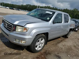 2014 Honda Ridgeline RTL z VIN 5FPYK1F58EB012869, wystawiony jako Copart lot #51854995 z przebiegiem 318 950 mil mil oraz Szkoda całkowita • Salvage title. Historia ofert i sprzedaży dostępna na DreamBid. Obrazek 1.