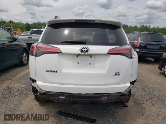 2017 Toyota RAV4 LE with VIN 2T3BFREV3HW607940, listed as a Copart auction lot 58330855 with 67,684 mi miles and Salvage title. Bid and sale history available at DreamBid. Image 6.