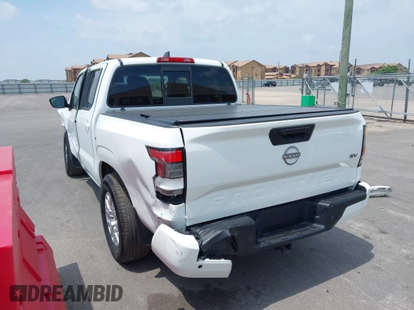 2022 Nissan Frontier SV z VIN 1N6ED1EJXNN693314, wystawiony jako IAAI lot #42322104 z przebiegiem 52 565 mil mil oraz . Historia ofert i sprzedaży dostępna na DreamBid. Obrazek 3.