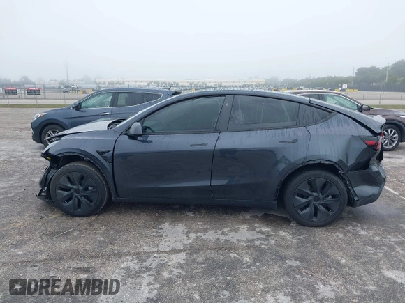 2024 Tesla Model Y with VIN 7SAYGDED8RF213927, listed as a IAAI auction lot 41386687 with 3,599 mi miles and . Bid and sale history available at DreamBid. Image 14.