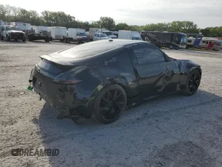 2014 Nissan 370Z z VIN JN1AZ4EH9EM636239, wystawiony jako Copart lot #69833264 z przebiegiem 110 802 mil mil oraz Szkoda całkowita • Salvage title. Historia ofert i sprzedaży dostępna na DreamBid. Obrazek 3.