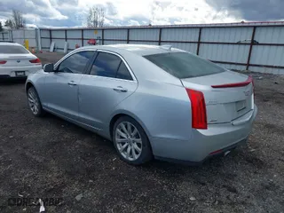 2017 Cadillac ATS Sedan AWD with VIN 1G6AG5RX4H0176223, listed as a IAAI auction lot 41980295 with 105,860 mi miles. Bid and sale history available at carsss.com. Image 3.