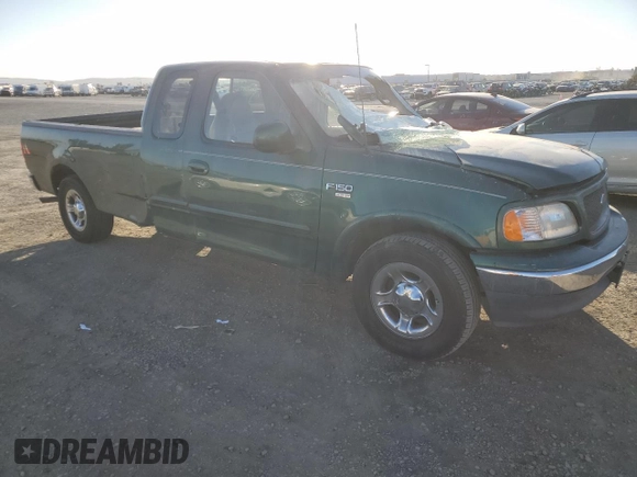 2000 Ford F-150 XL with VIN 1FTRX17W4YNB17453, listed as a Copart auction lot 52051215 with Not provided miles and Salvage title. Bid and sale history available at DreamBid. Image 4.