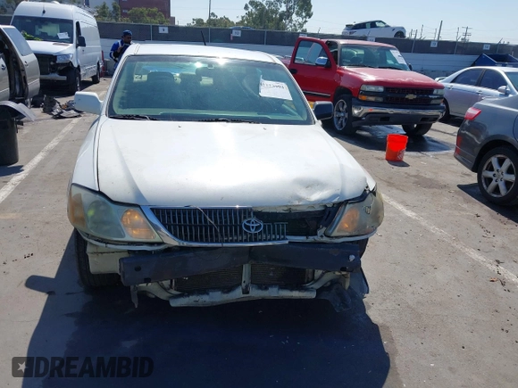2001 Toyota Avalon XL z VIN 4T1BF28B51U139054, wystawiony jako IAAI lot #42223994 z przebiegiem 250 902 mil mil oraz . Historia ofert i sprzedaży dostępna na DreamBid. Obrazek 6.