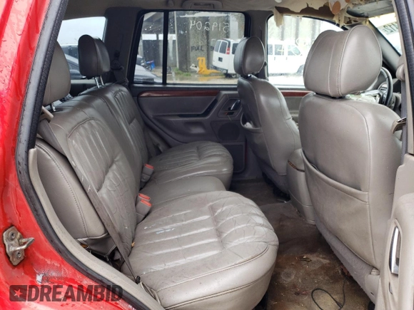 1999 Jeep Grand Cherokee Limited with VIN 1J4G268S8XC758964, listed as a Copart auction lot 71442794 with 321,284 mi miles and Non repairable. Bid and sale history available at DreamBid. Image 6.