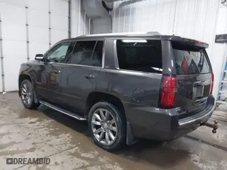 2016 Chevrolet Tahoe LTZ with VIN 1GNSKCKC7GR455033, listed as a IAAI auction lot 40811560 with 165,845 mi miles. Bid and sale history available at carsss.com. Image 3.