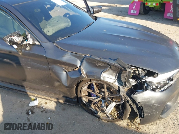 2019 BMW M5 Competition z VIN WBSJF0C59KB447419, wystawiony jako IAAI lot #41997505 z przebiegiem 74 990 mil mil oraz . Historia ofert i sprzedaży dostępna na DreamBid. Obrazek 6.