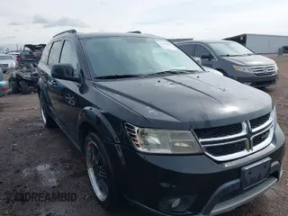 2014 Dodge Journey SXT with VIN 3C4PDCBG1ET127798, listed as a IAAI auction lot 41799898 with 178,873 mi miles and . Bid and sale history available at DreamBid. Image 1.