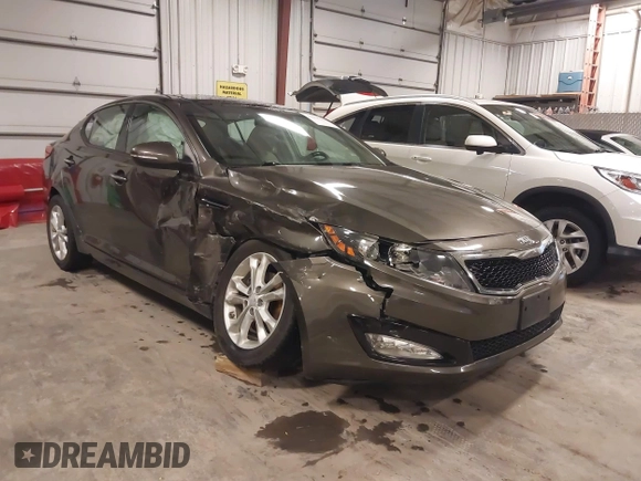 2013 Kia Optima EX with VIN 5XXGN4A72DG120129, listed as a IAAI auction lot 41858461 with 138,627 mi miles. Bid and sale history available at carsss.com. Image 1.