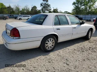 2003 Ford Crown Victoria LX z VIN 2FAFP74W03X209148, wystawiony jako Copart lot #53274575 z przebiegiem 127 739 mil mil oraz Szkody całkowita. Historia ofert i sprzedaży dostępna na DreamBid. Obrazek 3.