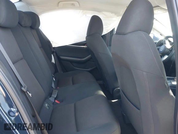 2021 Mazda 3 S with VIN JM1BPAALXM1326956, listed as a IAAI auction lot 42304248 with 55,104 mi miles and . Bid and sale history available at DreamBid. Image 8.