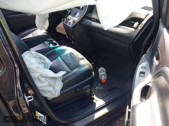 2015 Toyota Sienna SE with VIN 5TDXK3DC4FS581586, listed as a IAAI auction lot 41893274 with 263,577 mi miles. Bid and sale history available at carsss.com. Image 5.