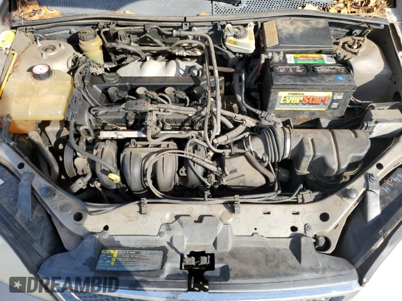 2005 Ford Focus S with VIN 1FAFP34N35W141023, listed as a Copart auction lot 84230574 with 244,545 mi miles and Salvage Title. Bid and sale history available at carsss.com. Image 12.