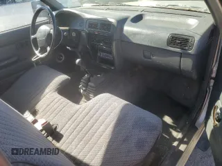 1996 Nissan Frontier XE z VIN 1N6SD11Y5TC327761, wystawiony jako Copart lot #79662594 z przebiegiem 151 631 mil mil oraz Szkoda całkowita • Salvage title. Historia ofert i sprzedaży dostępna na DreamBid. Obrazek 8.