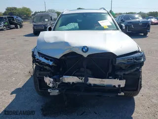 2020 BMW X7 xDrive40i with VIN 5UXCW2C00L9A03002, listed as a IAAI auction lot 41856130 with 33,713 mi miles. Bid and sale history available at carsss.com. Image 6.