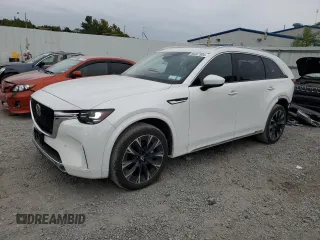 2024 Mazda CX-90 3.3 Turbo S with VIN JM3KK1HC3R1115570, listed as a Copart auction lot 69467504 with 8,379 mi miles and Salvage Title. Bid and sale history available at carsss.com. Image 1.