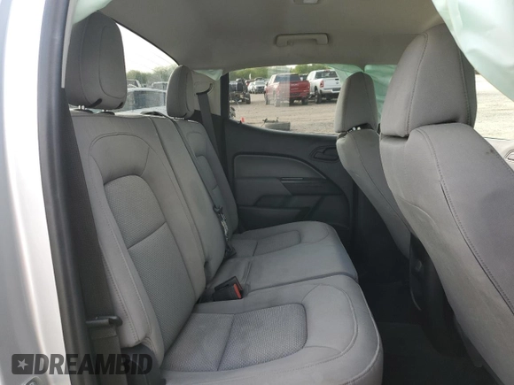 2016 GMC Canyon 2WD with VIN 1GTG5BE31G1383286, listed as a Copart auction lot 82579034 with 106,479 mi miles and Salvage Title. Bid and sale history available at carsss.com. Image 10.