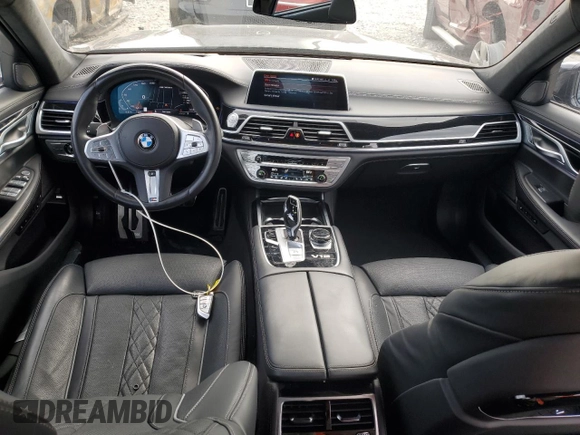2022 BMW 7 Series with VIN WBA7U6C06NCK59421, listed as a Copart auction lot 80159874 with 24,033 mi miles and Salvage title. Bid and sale history available at DreamBid. Image 8.