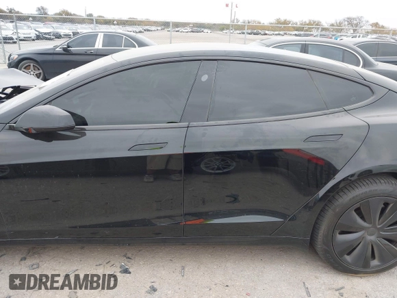 2022 Tesla Model S Plaid with VIN 5YJSA1E65NF484149, listed as a IAAI auction lot 40937538 with 11,459 mi miles and . Bid and sale history available at DreamBid. Image 13.