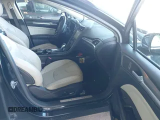 2014 Ford Fusion Titanium with VIN 3FA6P0K97ER328482, listed as a IAAI auction lot 40252350 with 137,128 mi miles. Bid and sale history available at carsss.com. Image 5.