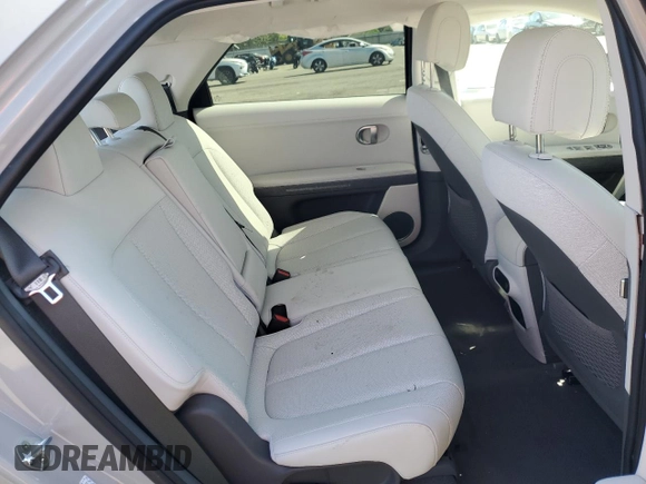 2023 Hyundai Ioniq 5 SEL z VIN KM8KNDAF0PU180518, wystawiony jako Copart lot #52529505 z przebiegiem 36 474 mil mil oraz Szkoda całkowita • Salvage title. Historia ofert i sprzedaży dostępna na DreamBid. Obrazek 10.
