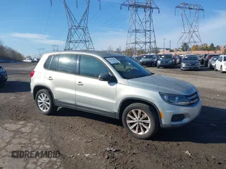2014 Volkswagen Tiguan S z VIN WVGBV3AX4EW526347, wystawiony jako IAAI lot #40945006 z przebiegiem Nie podano mil oraz . Historia ofert i sprzedaży dostępna na DreamBid. Obrazek 1.