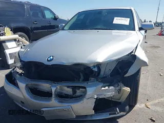 2010 BMW 5 Series 528i with VIN WBANU5C51AC125956, listed as a IAAI auction lot 41845322 with 318,279 mi miles and . Bid and sale history available at carsss.com. Image 6.