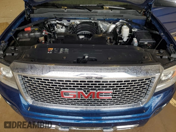 2015 GMC Sierra 1500 Denali z VIN 3GTU2WEC1FG475582, wystawiony jako Copart lot #55149415 z przebiegiem 79 350 mil mil oraz Czysty tytuł • Clean title. Historia ofert i sprzedaży dostępna na DreamBid. Obrazek 11.