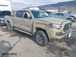 2016 Toyota Tacoma SR5 with VIN 3TMDZ5BN8GM006584, listed as a IAAI auction lot 41405736 with NaN miles. Bid and sale history available at carsss.com. Image 1.