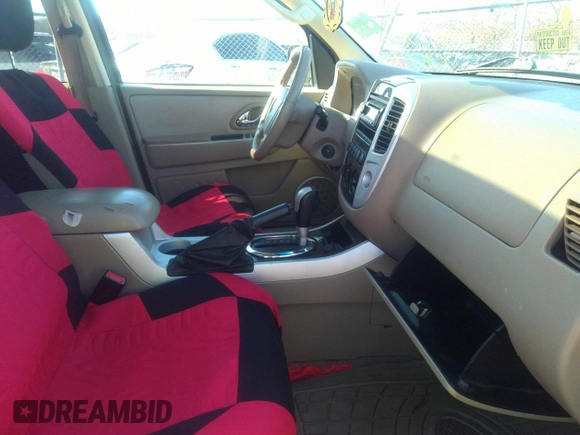 2007 Mercury Mariner Luxury with VIN 4M2YU91157KJ09372, listed as a IAAI auction lot 38729017 with Not provided miles and . Bid and sale history available at DreamBid. Image 5.