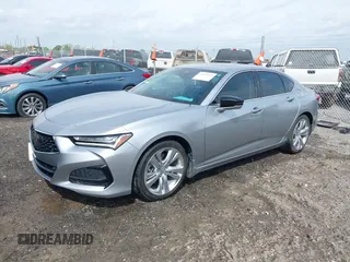 2021 Acura TLX Technology z VIN 19UUB6F41MA002737, wystawiony jako IAAI lot #41925713 z przebiegiem 28 599 mil mil oraz . Historia ofert i sprzedaży dostępna na DreamBid. Obrazek 2.