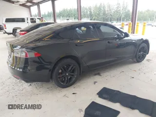 2013 Tesla Model S Performance с VIN 5YJSA1DP1DFP23818, выставлен на аукционе IAAI как лот 42594561 с пробегом 142 878 миль миль и . История ставок и продаж доступна на DreamBid. Изображение 4.